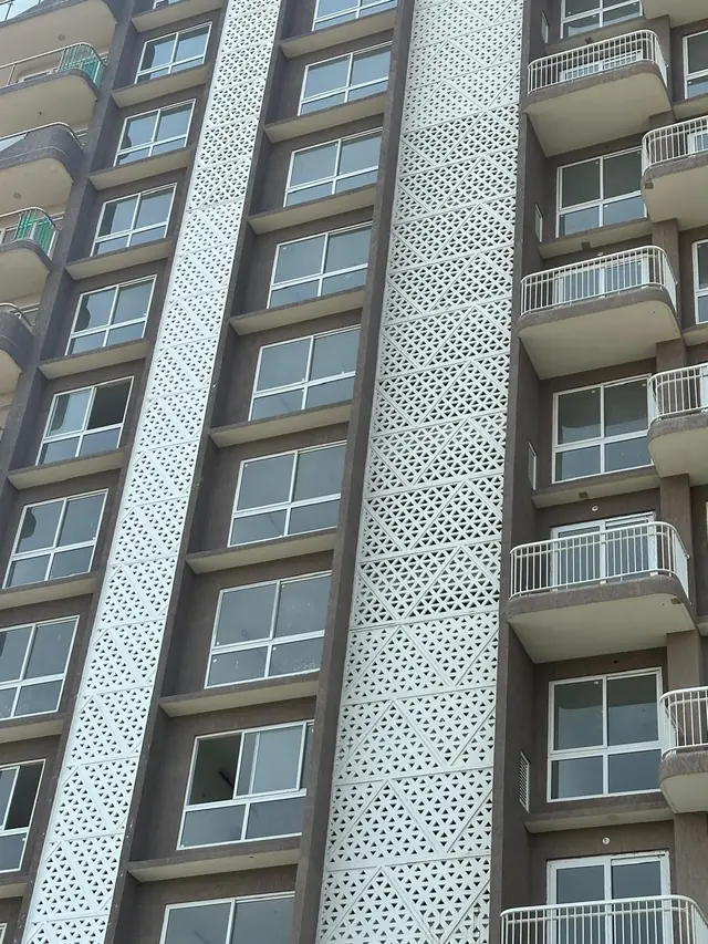 Close view of the jali bands between rows of windows