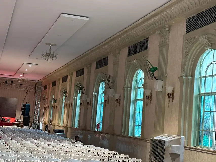 The hall, with arched windows and pilasters along the wall