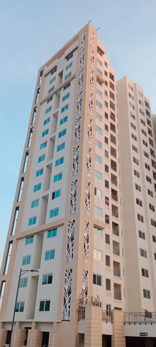 Tower seen from below, with decorative panels along each edge